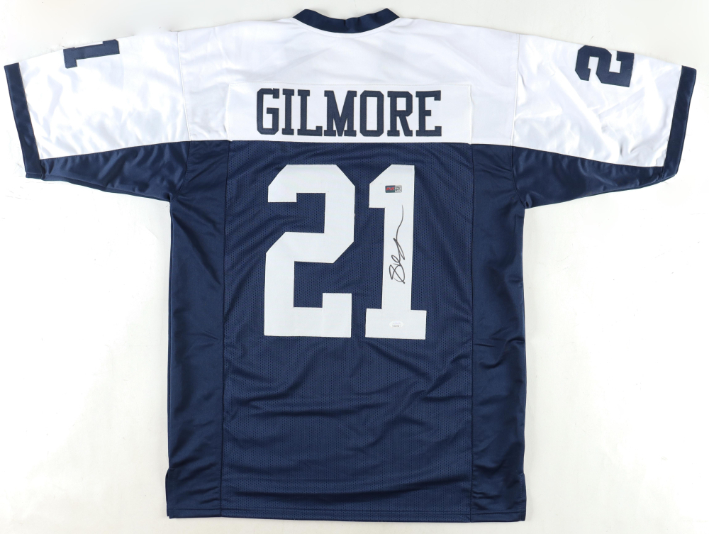 Stephon Gilmore Signed Jersey (JSA) and Stephon Gilmore Signed Cowboys Speed Mini Helmet (JSA)