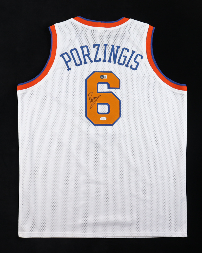 Kristaps Porzingis Signed New York Knicks Jersey (Beckett & JSA), Kristaps Porzingis Signed Washington Wizards Jersey (JSA), & Kristaps Porzingis Signed Boston Celtics 8x10 Photo (Beckett)