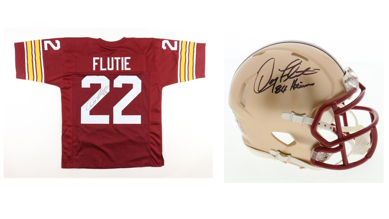 Doug Flutie Signed Boston College Eagles Jersey (JSA) and Doug Flutie Signed Boston College Eagles Speed Mini Helmet Inscribed "84 Heisman" (Beckett)