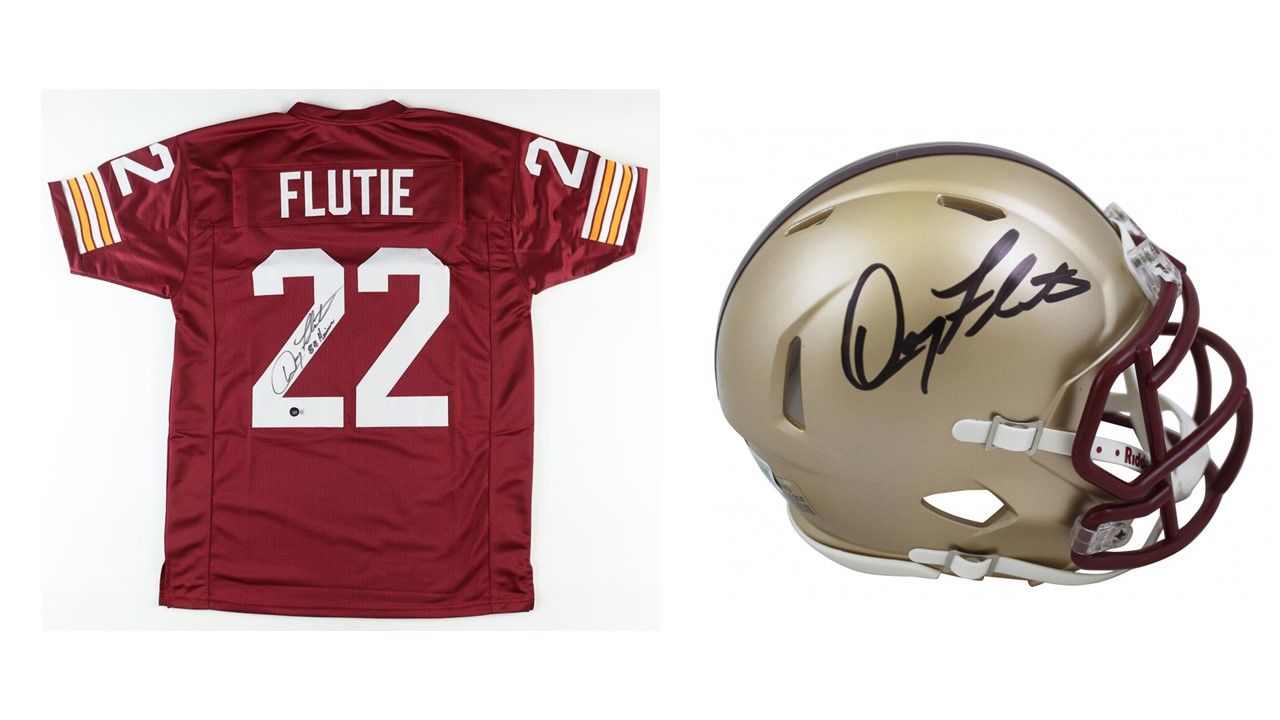 Doug Flutie Signed Boston College Eagles Jersey Inscribed "84 Heisman" (Beckett) and Doug Flutie Signed Boston College Eagles Speed Mini Helmet (Beckett)