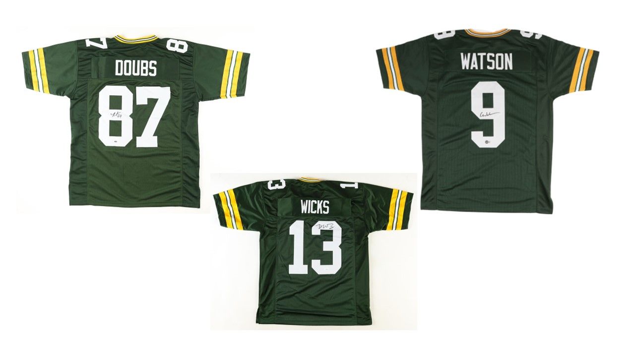 Romeo Doubs Signed Green Bay Packers Jersey (OKAuthentics), Dontayvion Wicks Signed Green Bay Packers Jersey (JSA), & Christian Watson Signed Green Bay Packers Jersey (Beckett)
