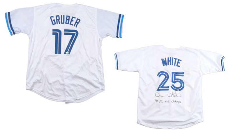 Kelly Gruber Signed Toronto Blue Jays Jersey (JSA) & Devon White Signed Toronto Blue Jays Jersey Inscribed "92, 93 WS Champs" (Beckett)