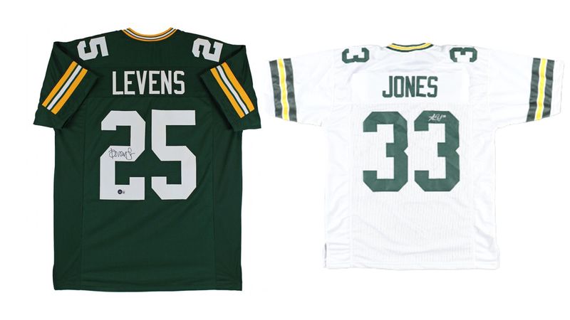 Aaron Jones Signed Green Bay Packers Jersey (OKAuthentics) & Dorsey Levens Signed Green Bay Packers Jersey (Beckett) Aaron Jones Signed Green Bay Packers Jersey (OKAuthentics) & Dorsey Levens Signed Green Bay Packers Jersey (Beckett)