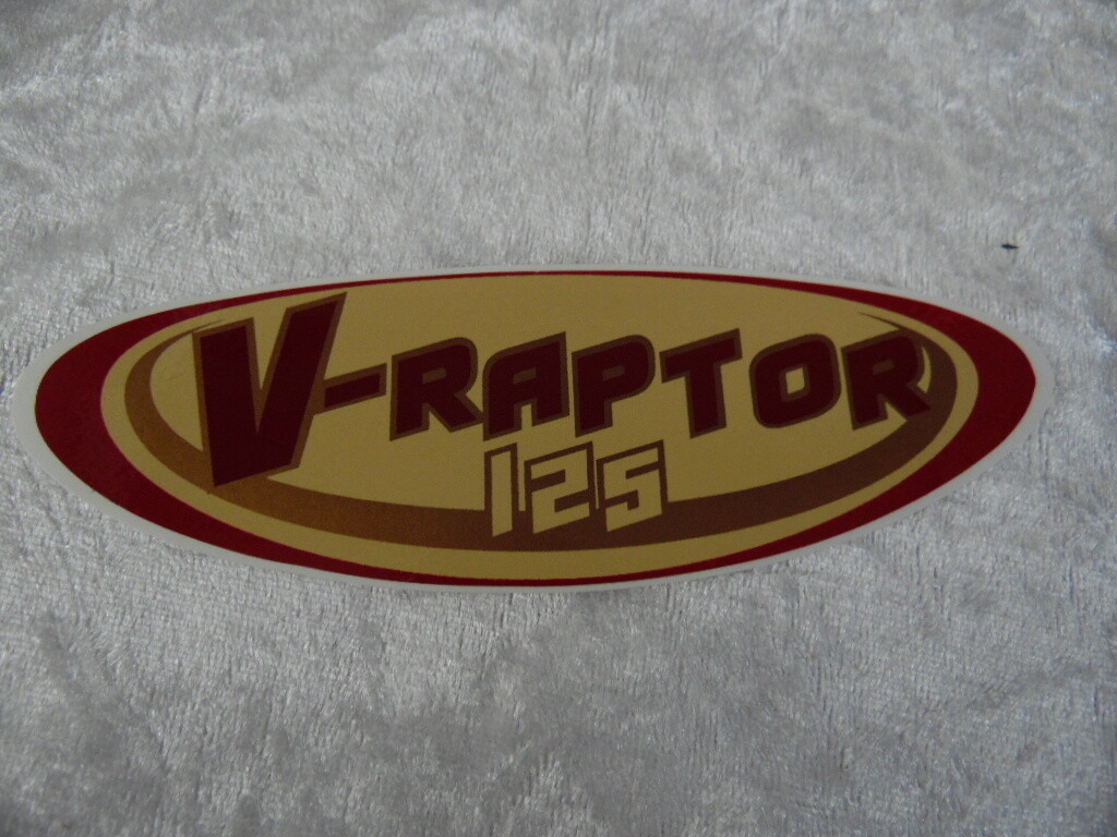 Seitendeckel Emblem V-Raptor 125