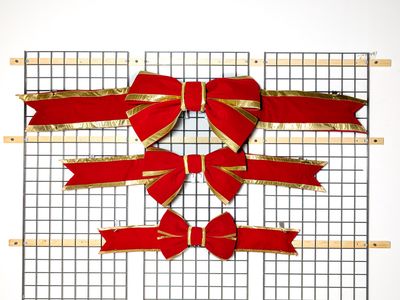 Red Bow with Gold Trim – vibrant, durable holiday decoration for indoor and outdoor use.