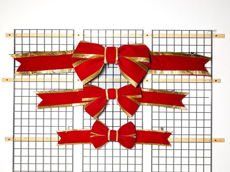 Red Bow with Gold Trim – vibrant, durable holiday decoration for indoor and outdoor use.