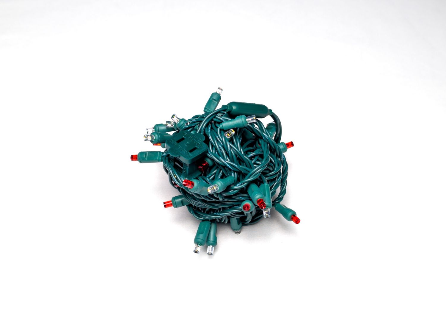 Mini Lights Old Fashion Candy Cane with 6-inch spacing, 50 red and white lights on green wire for professional holiday lighting installations.