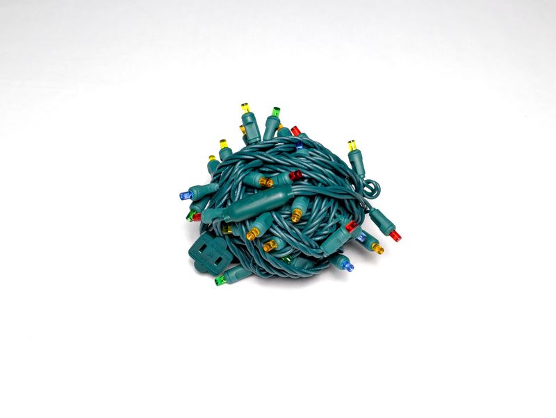 Mini Lights Multi-Color with 6-inch spacing, 50 vibrant lights on green wire for professional holiday and decorative lighting.
