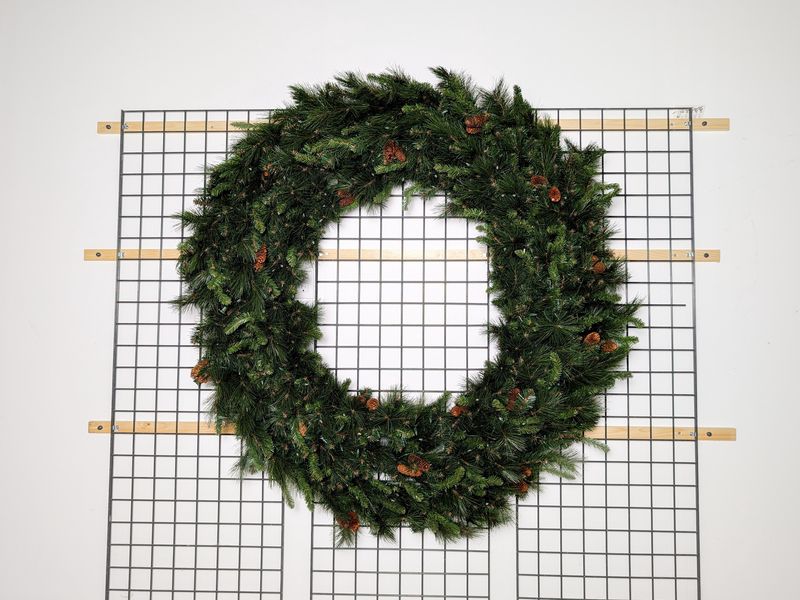 Warm White Noble Wreath – pre-lit with warm white LED lights, durable for indoor and outdoor use.