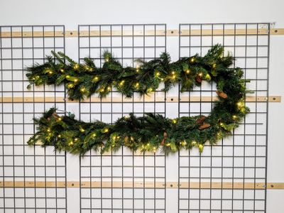 Warm White Noble Garland - 9'x14" Warm White Noble Garland 9’x14” – pre-lit with warm white LED lights, durable for indoor and outdoor use.