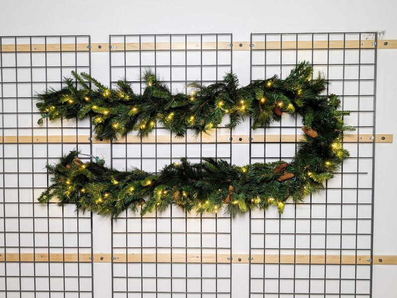 Warm White Noble Garland 9’x14” – pre-lit with warm white LED lights, durable for indoor and outdoor use.