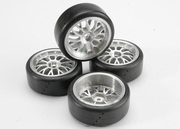 4873  Tires, Pro-Trax on-road (medium compound with contoured inserts) (mounted and glued to part #4872 wheels) (2 left, 2 right)