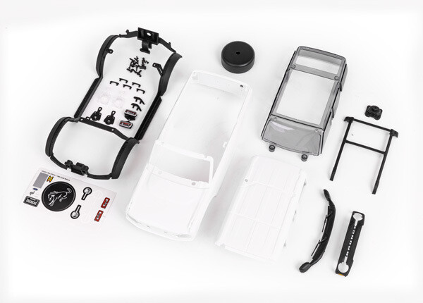 9711 Body, Ford Bronco, complete (unassembled) (white, requires painting) (includes grille, side mirrors, door handles, fender flares, windshield wipers, spare tire mount, &amp; clipless mounting)
