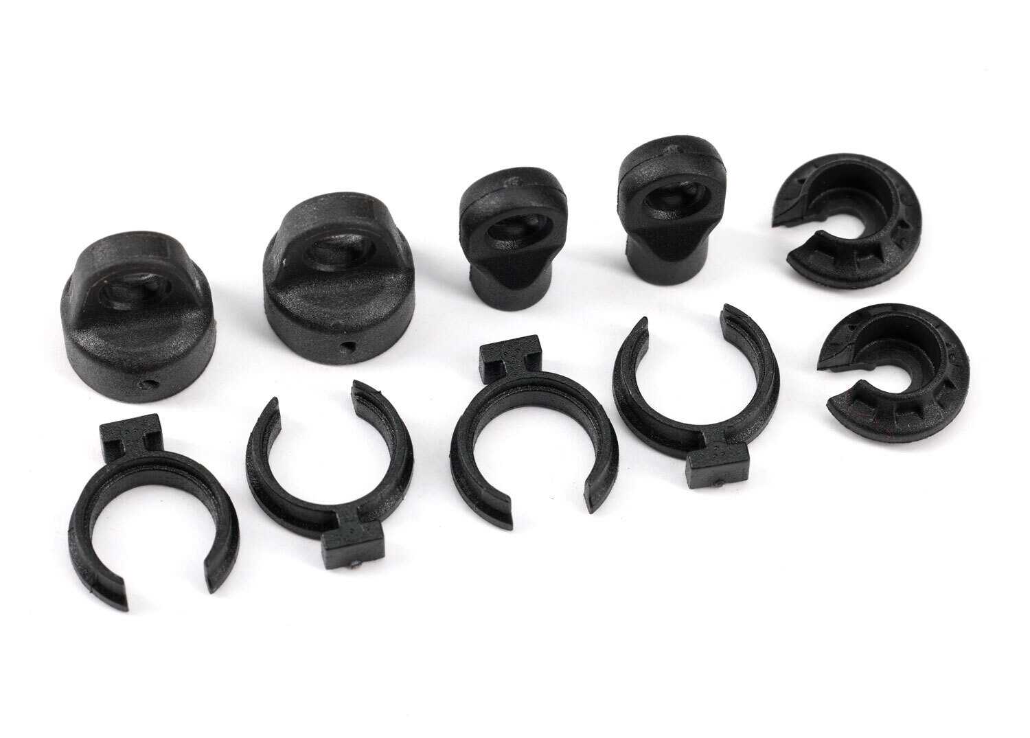 9762A Shock cap (2)/ spring perch (2)/ rod end (2)/ spring preload spacer (4)