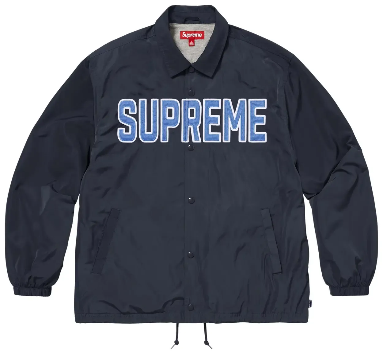 SUPREME SPELLOUT COACHES JACKET NAVY