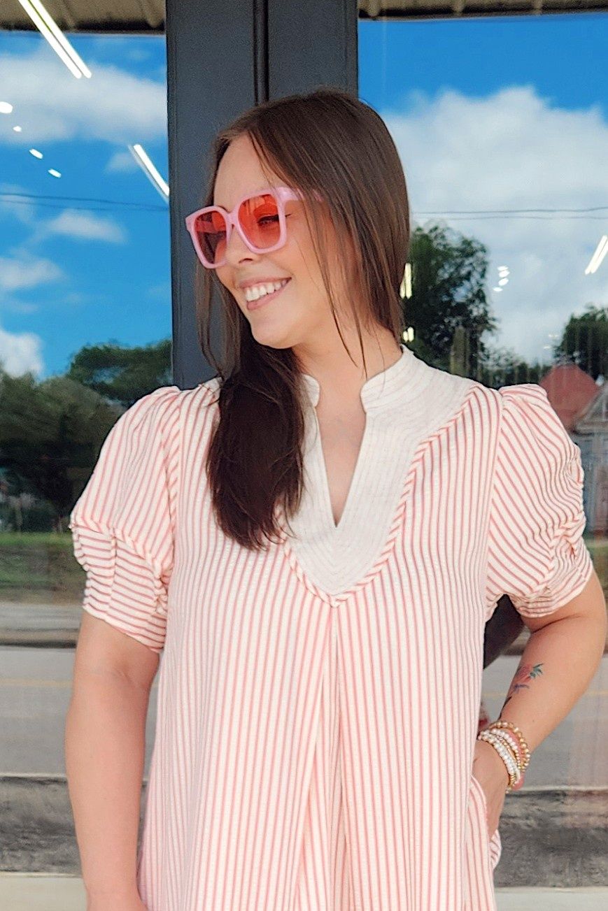 Linny in Pink Sunglasses
