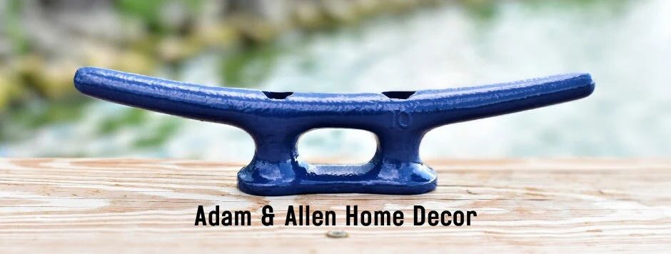 10-inch powder coated dock cleat on wood surface, used for boat tie-downs, wall hooks, or coastal home and dockside decor 