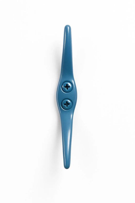 2.5-inch powder coated rope cleat mounted with matching screws, ideal as a nautical drawer pull, hook, or decor hardware.