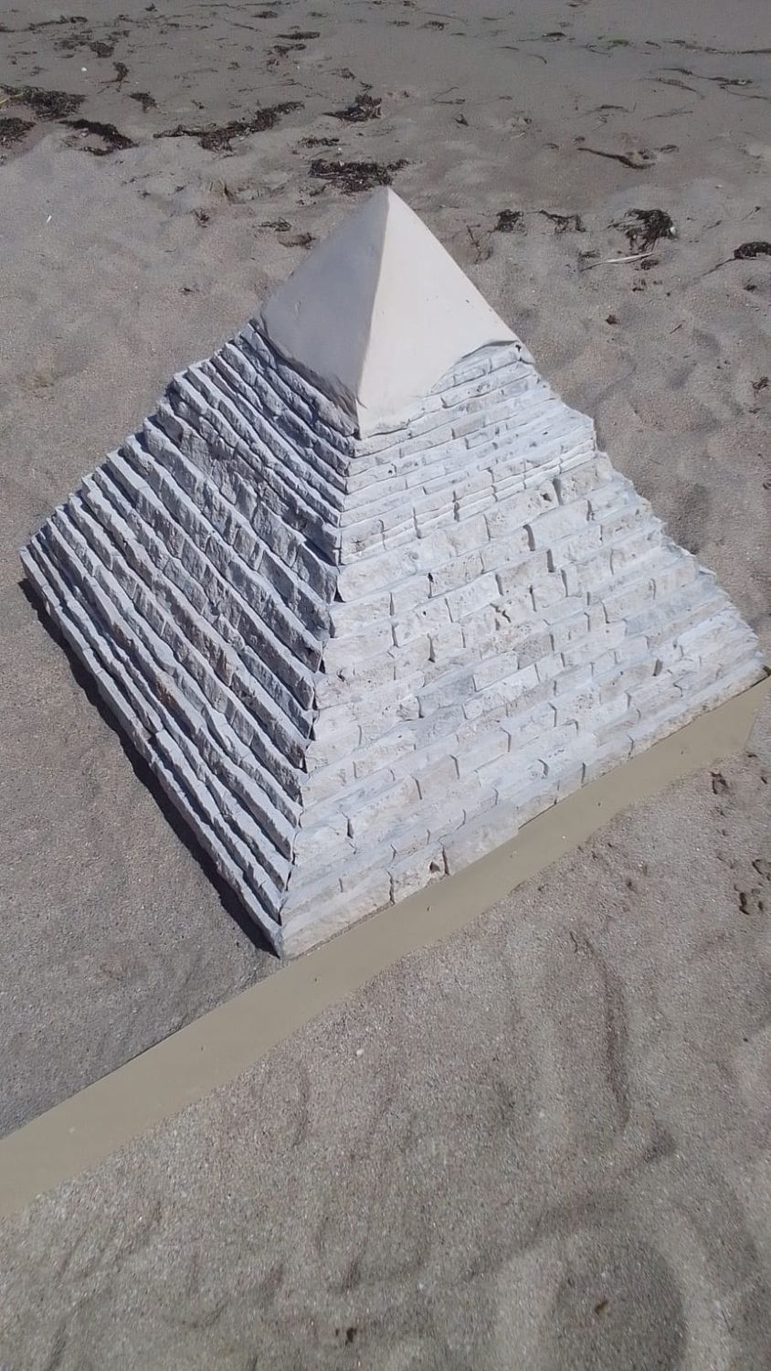 Model of Great Pyramid of Cheops in Egypt made of stone just like the ancient builders