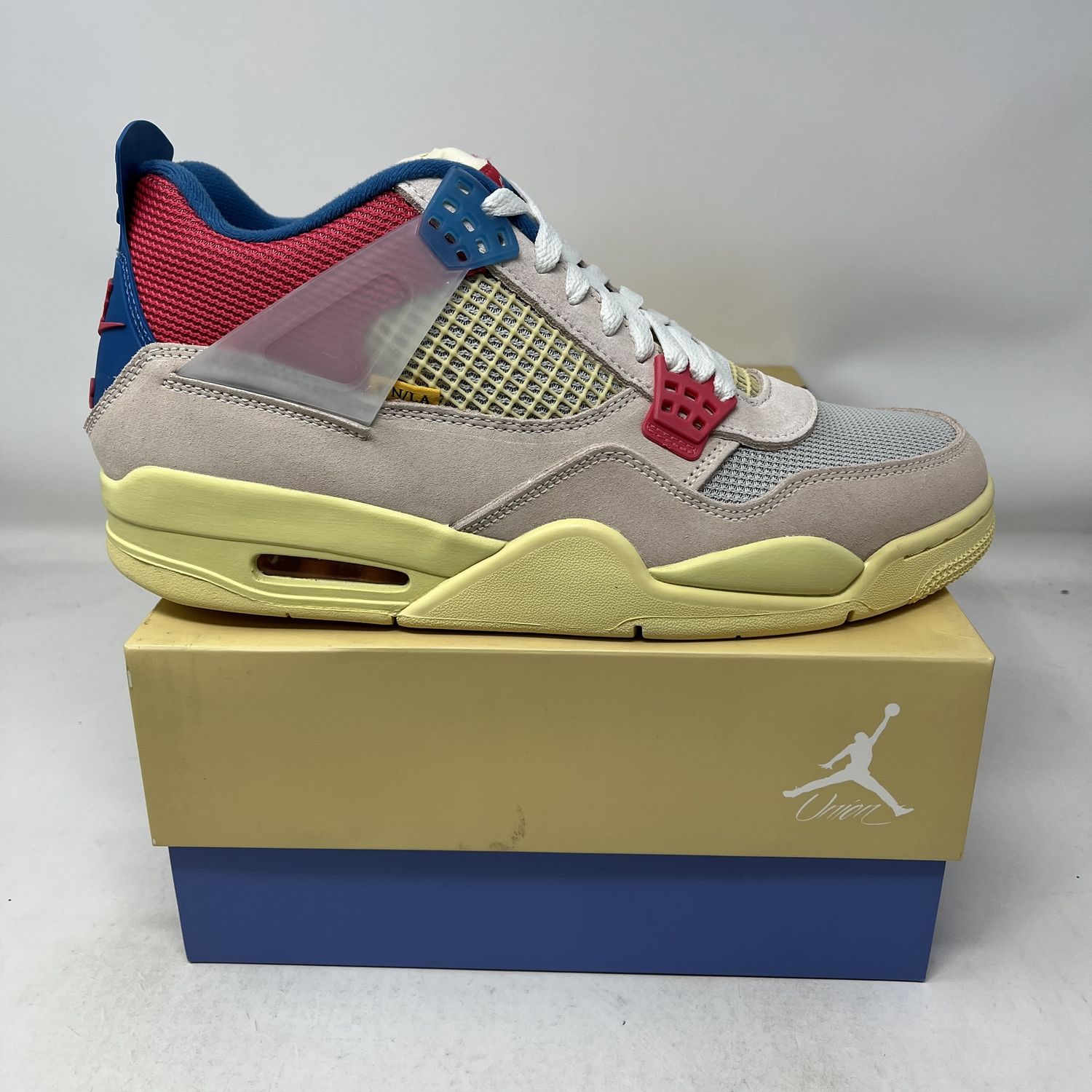 Jordan 4 Retro Union Guava Ice