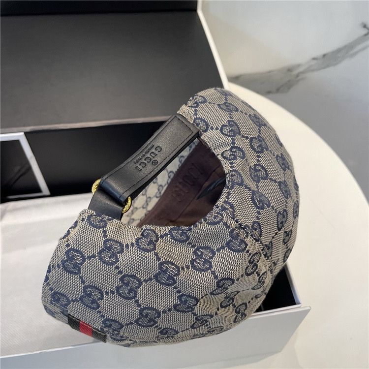 Gray Gucci Hat with red and black stripe