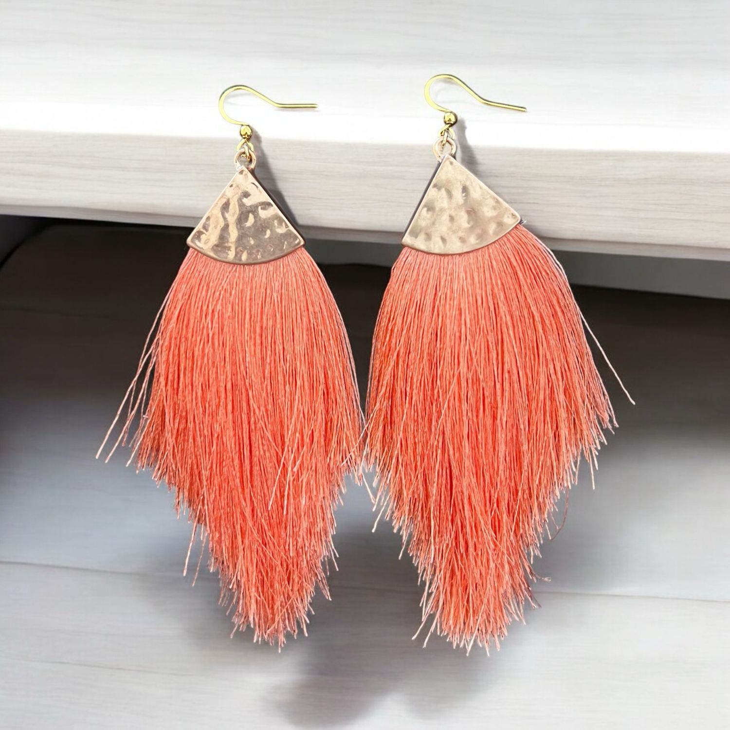 Pompons corail