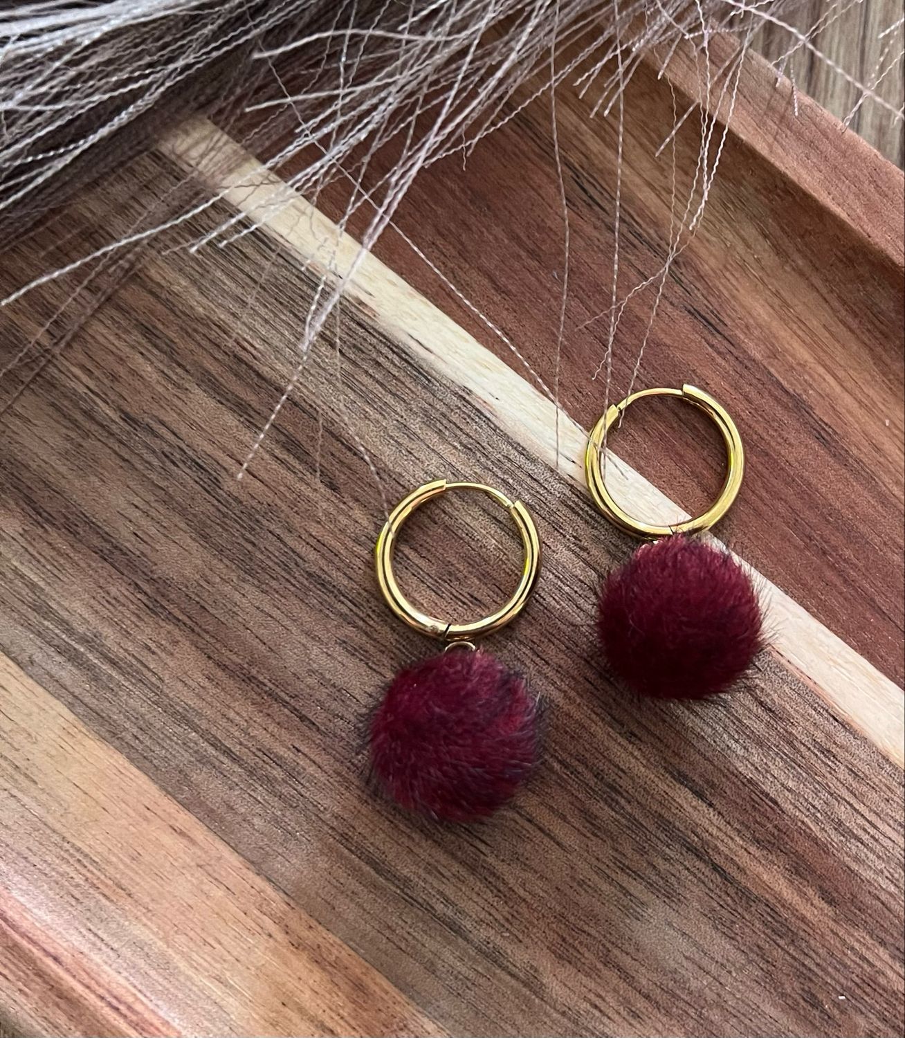 Pompons bordeaux
