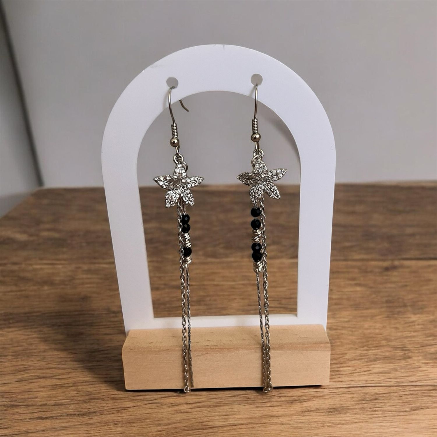 Boucle d’oreille fleur argenté