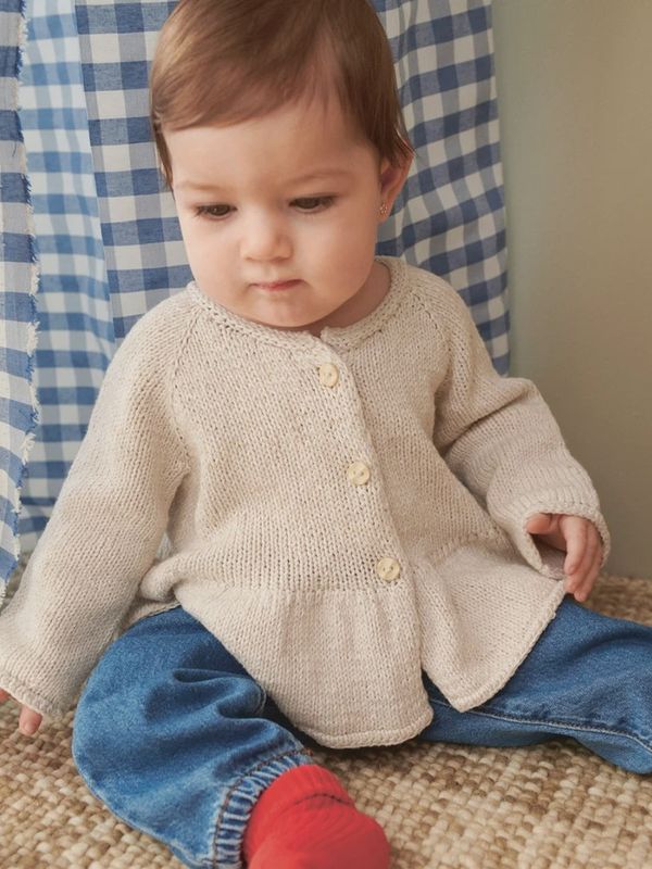 Dina Peplum Cardigan - Baby / Sandnes Garn Pattern