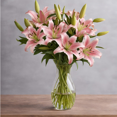peach lilies in vase