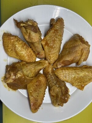 Marinated chicken wings in our special sauce.