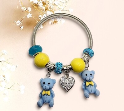 Pulsera con dije de oso azul sereno