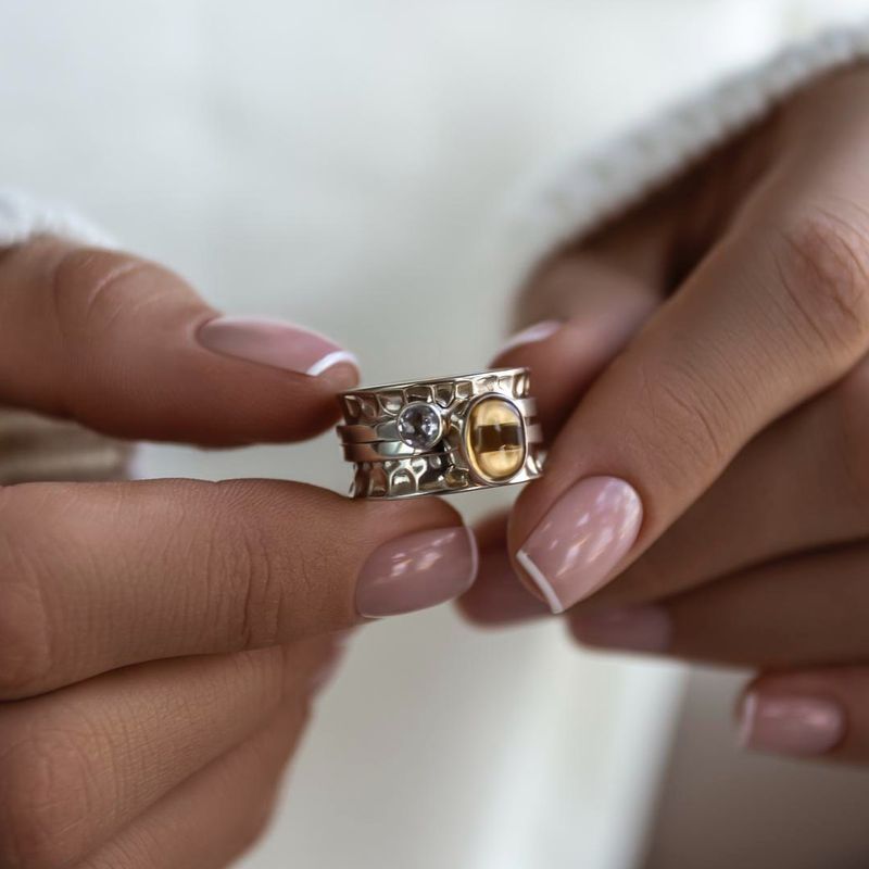 ISLAND SOUL Mechanism Ring with Oval Cabochon Citrine and Round White Topaz, Silver 925