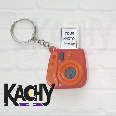 Cámara porta foto