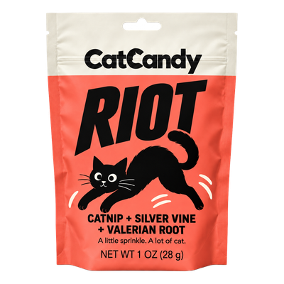 CatCandy Riot catnip, silver vine, and valerian root blend, front of red-orange 1 oz pouch with black cat illustration