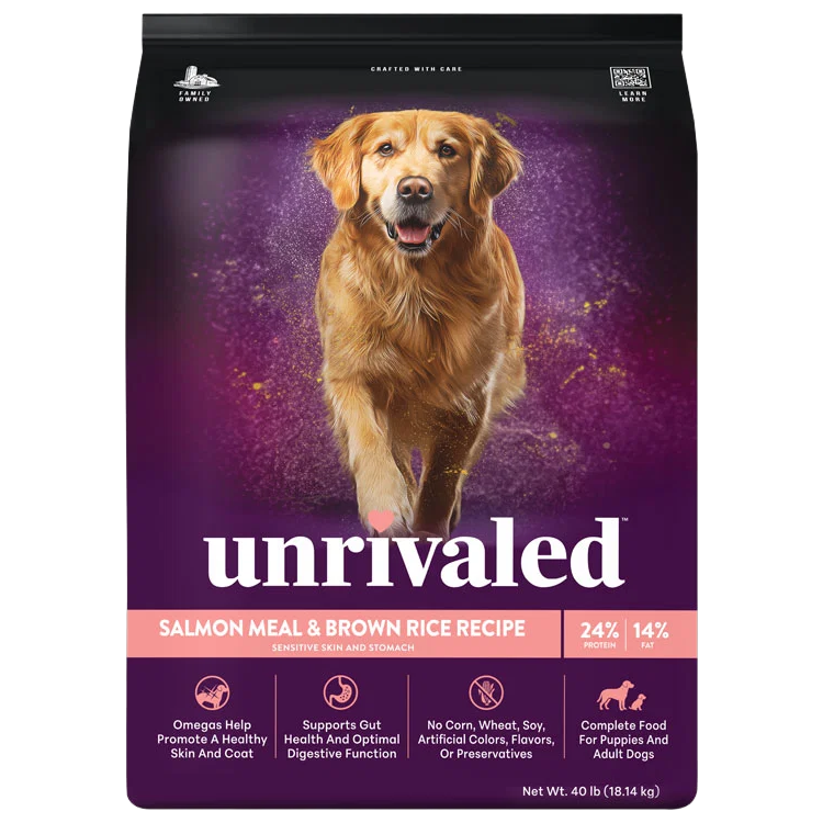 Front of Unrivaled Salmon Meal &amp; Brown Rice Recipe 40 lb dog food bag with a golden retriever on purple packaging