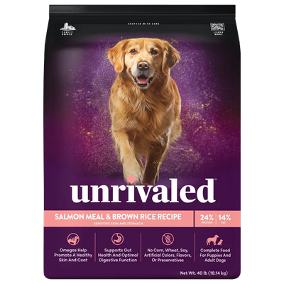 Front of Unrivaled Salmon Meal &amp; Brown Rice Recipe 40 lb dog food bag with a golden retriever on purple packaging