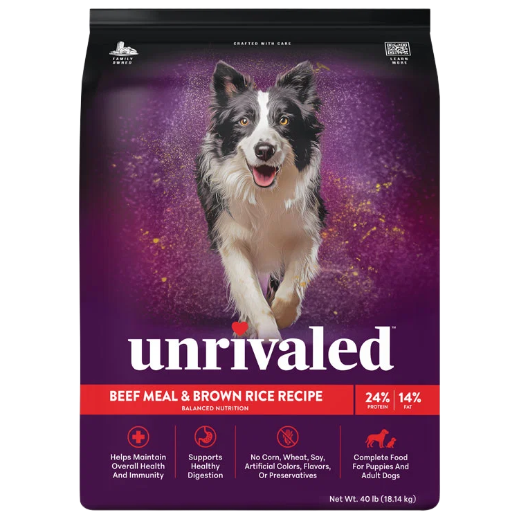 Front of Unrivaled Beef Meal &amp; Brown Rice Recipe 40 lb dog food bag with a black-and-white dog on purple packaging