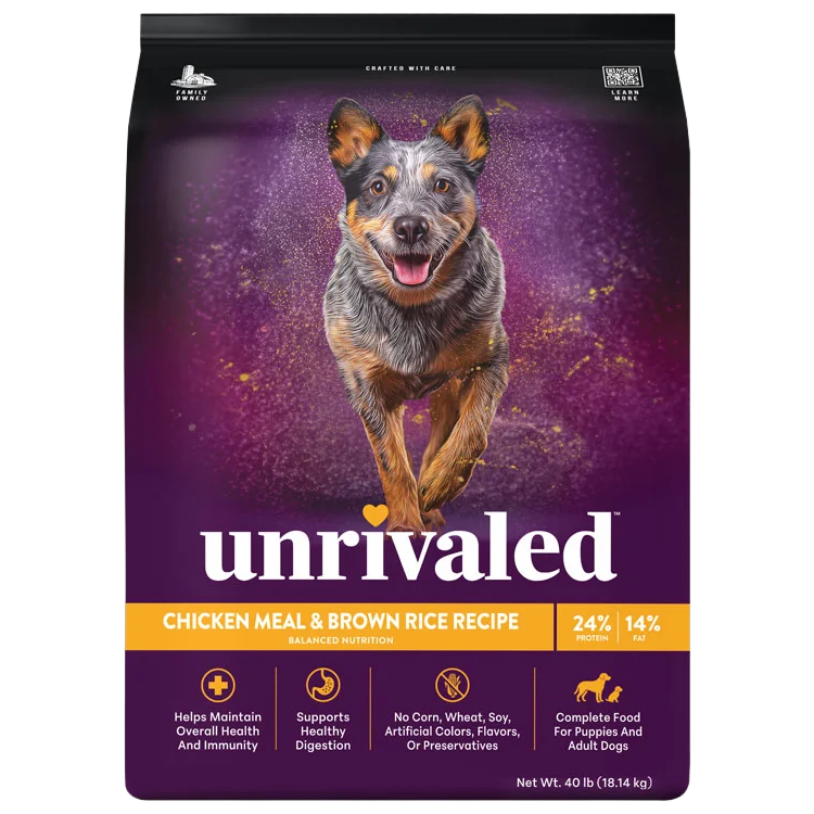 Front of Unrivaled Chicken Meal &amp; Brown Rice Recipe 40 lb dog food bag with a running dog on purple packaging and yellow label