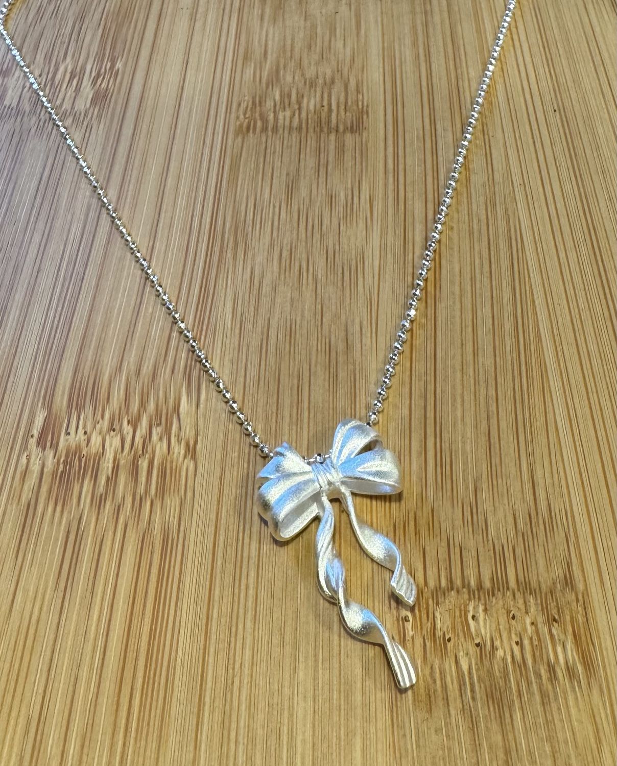 Sterling Silver Ribbon Bow Necklace