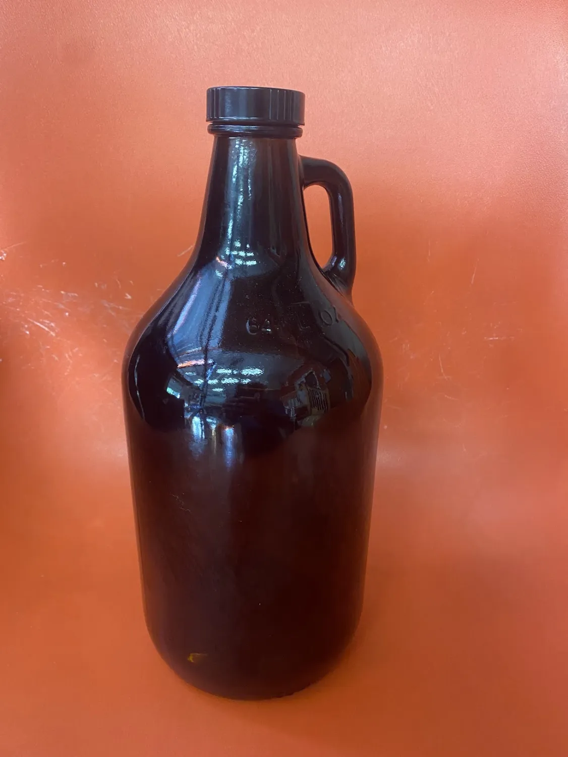 Used 64 fl oz Growler w/Polyseal Cap