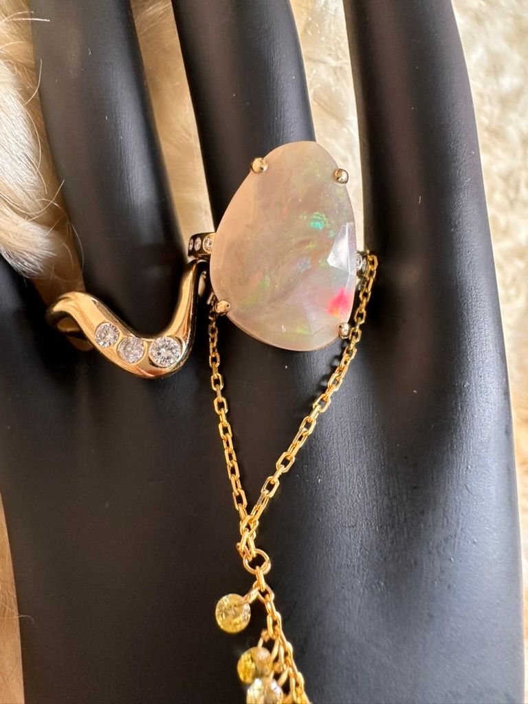 The Fire Opal and Diamond Ring