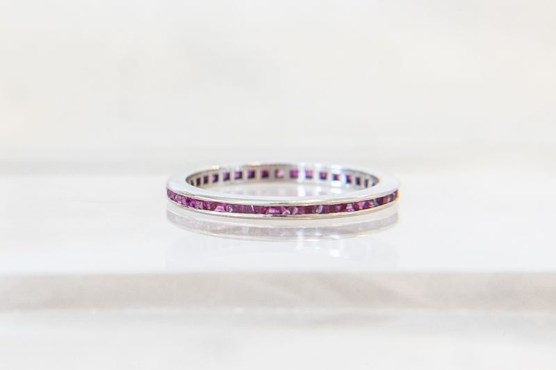 Platinum Art Deco Calibre-Cut Ruby Eternity Ring