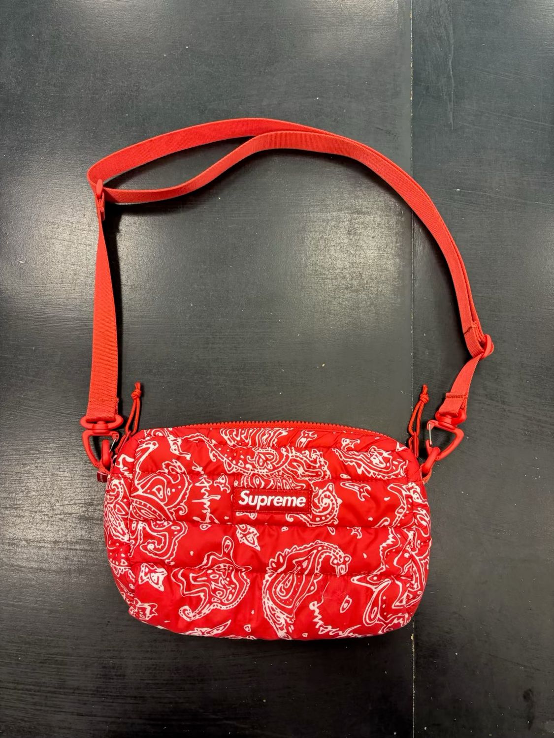 PO SUPREME PUFFER SIDE BAG RED PAISLEY