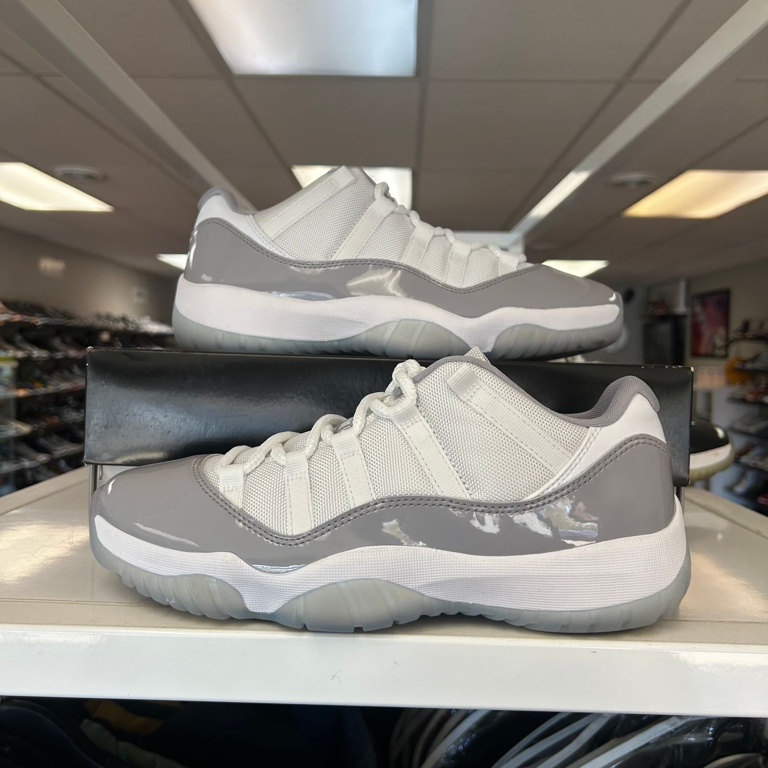 PO AIR JORDAN 11 RETRO LOW CEMENT GREY SIZE 9