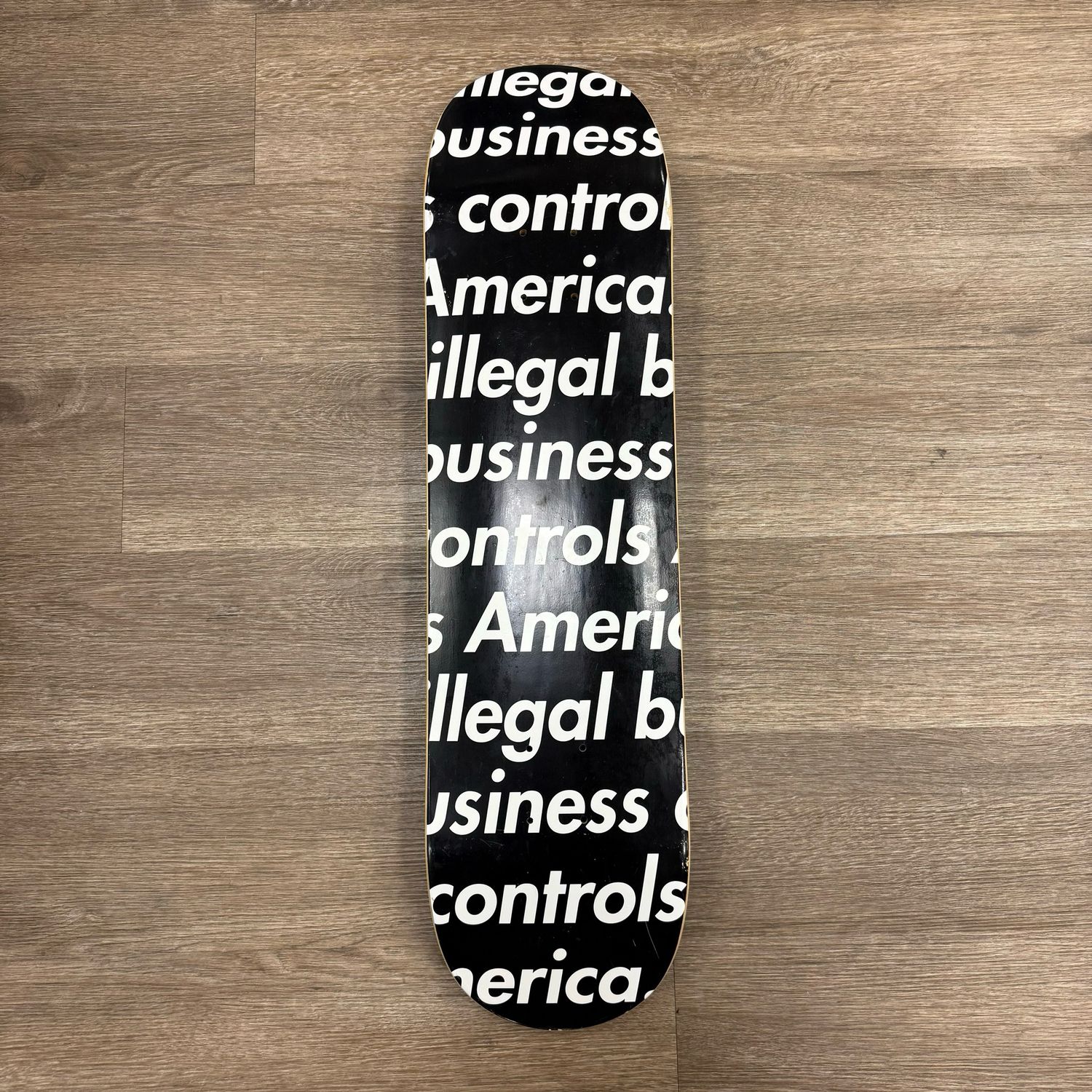 PO SUPREME ILLEGAL BUSINESS SKATEBOARD DECK BLACK