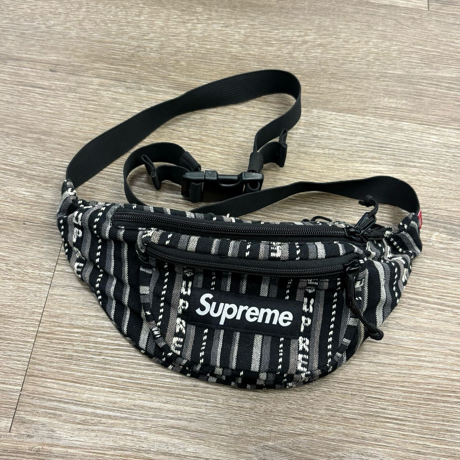 PO SUPREME WOVEN STRIPE WAIST BAG BLACK