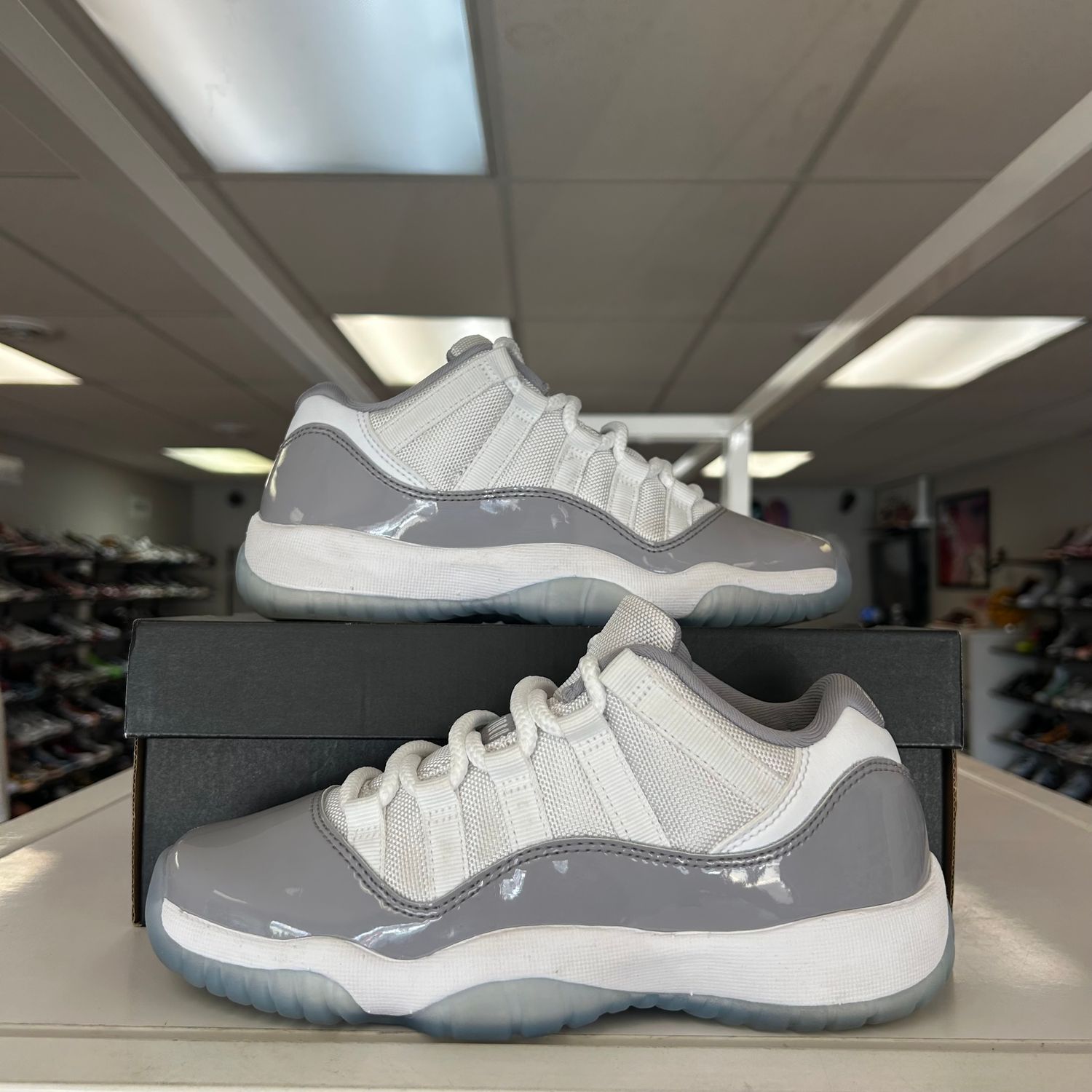 PO AIR JORDAN 11 RETRO LOW CEMENT GREY (GS) SIZE 4Y