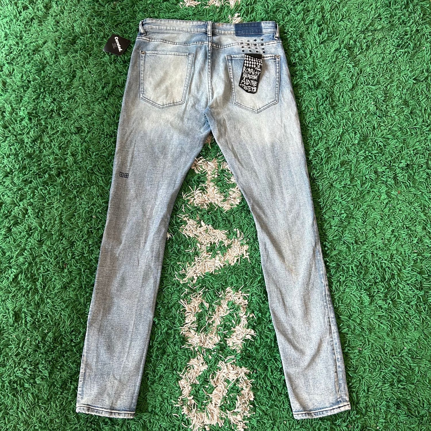 PO KSUBI VAN WINKLE SKINNY JEANS LIGHT WASH LEFT KNEE RIP SIZE 34