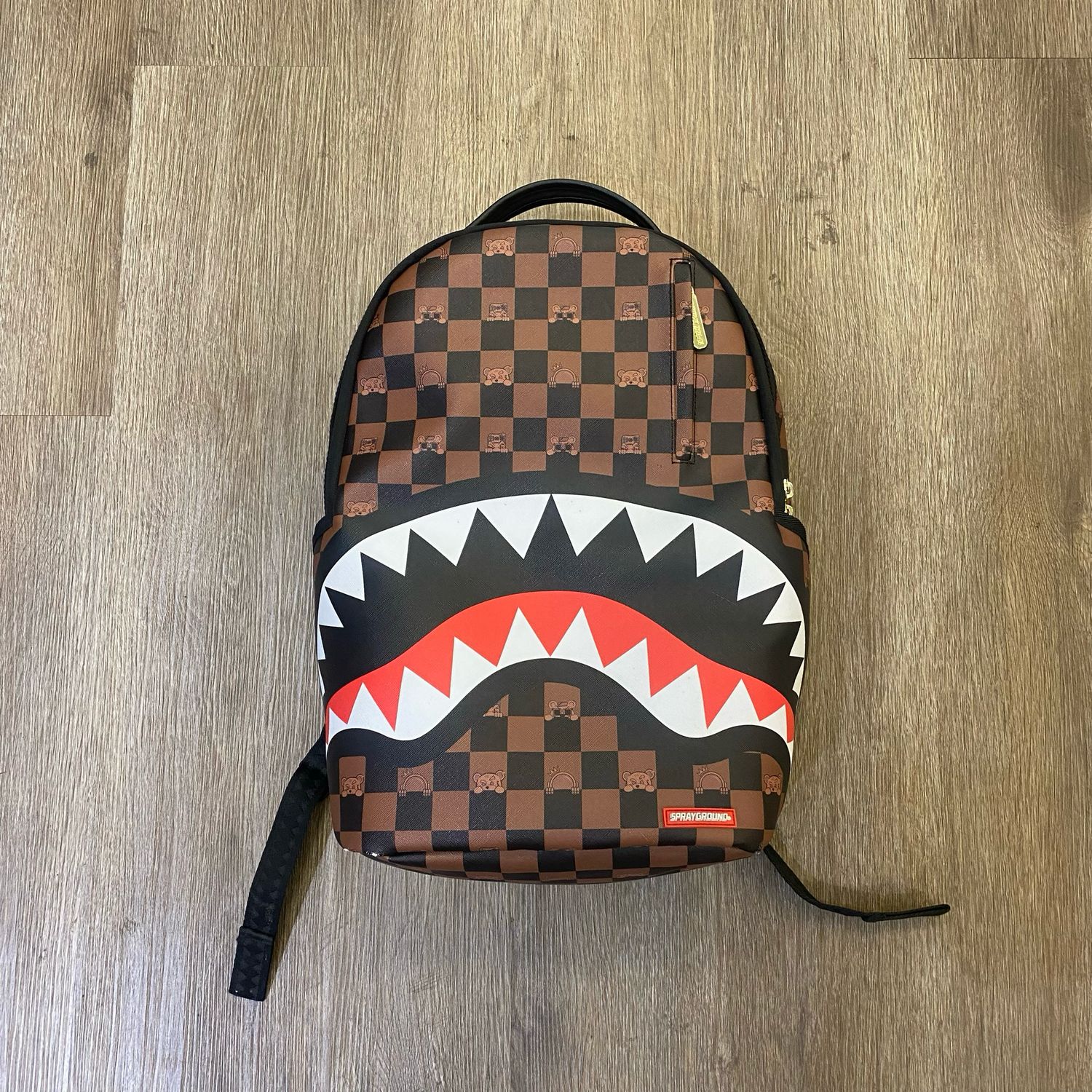 PO SPRAYGROUND PEEKING CHARACTER CHECK BACKPACK